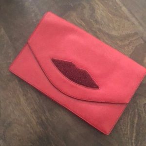 Red leather clutch with lips detail